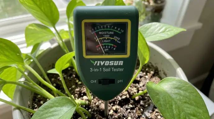 VIVOSUN 3-in-1 Soil Tester showing moisture, light, and pH measurement functions on its dial.